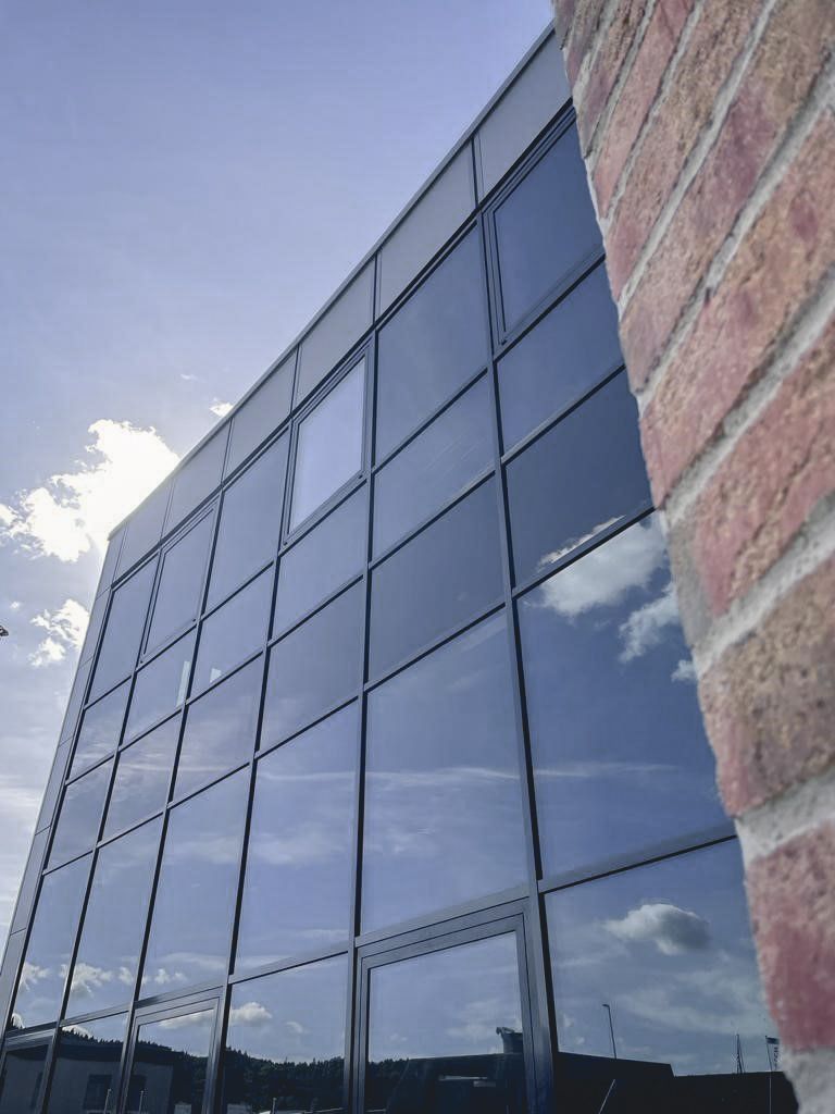 Neubau Mauthe Uhrenmanufaktur Deisslingen Glasfassade